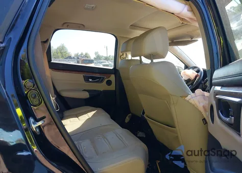 2018 Honda Cr-V Touring z USA, uszkodzony, nr VIN 7FARW2H94JE099983